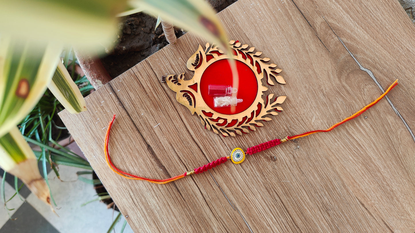 Yellow Eye Macrame Rakhi