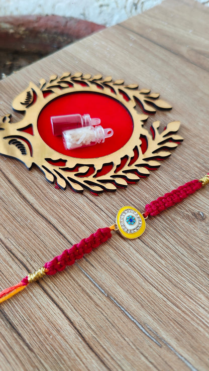 Yellow Eye Macrame Rakhi