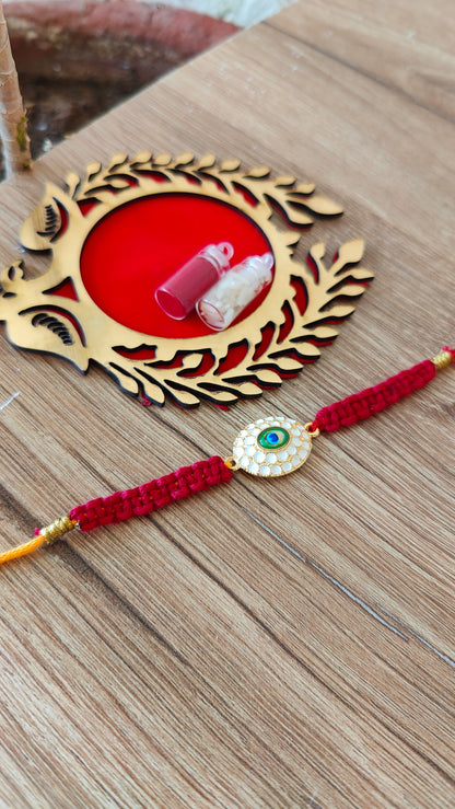 Oval golden peacock Macrame Rakhi