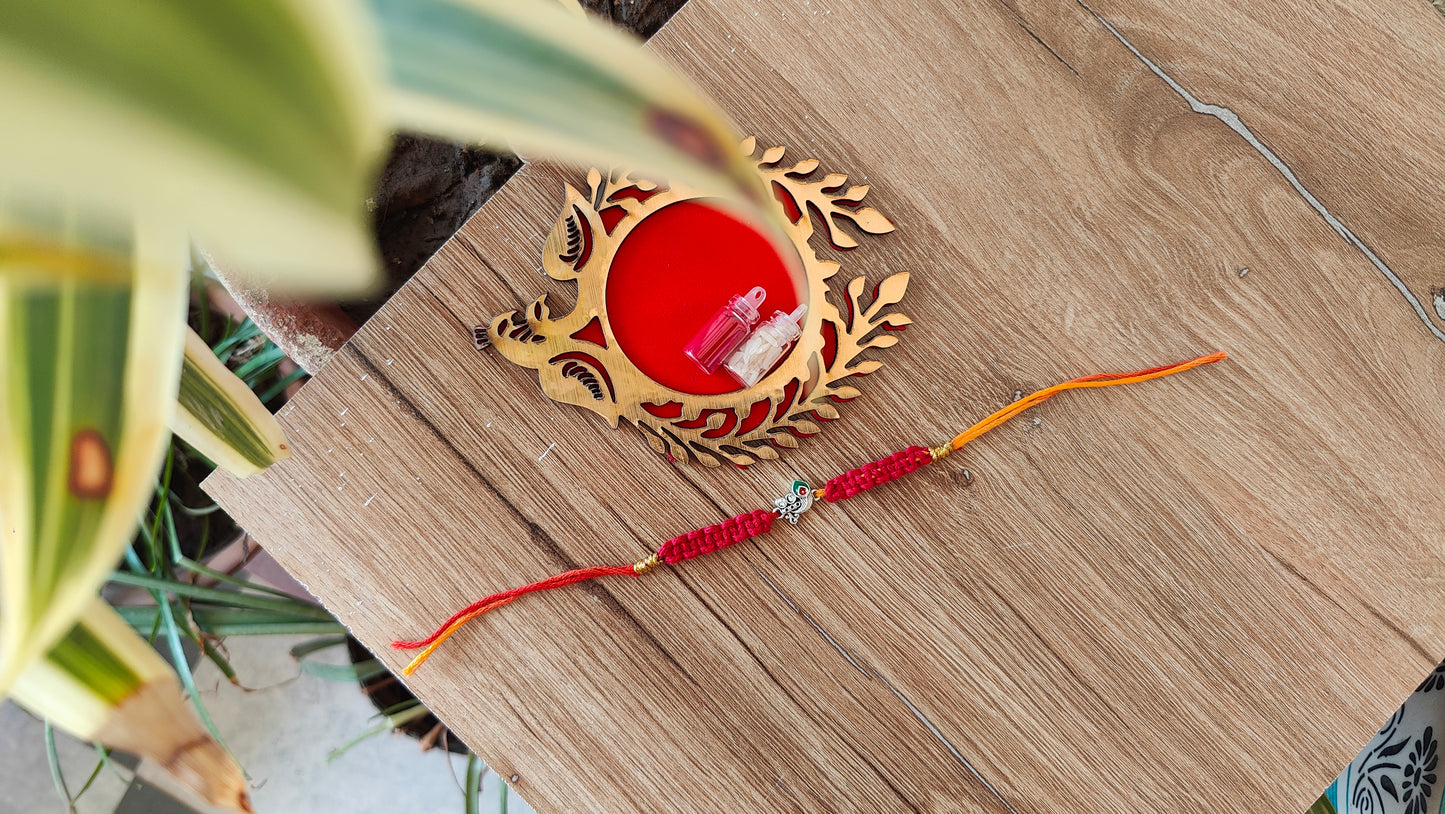 Silver Peacock Macrame Rakhi
