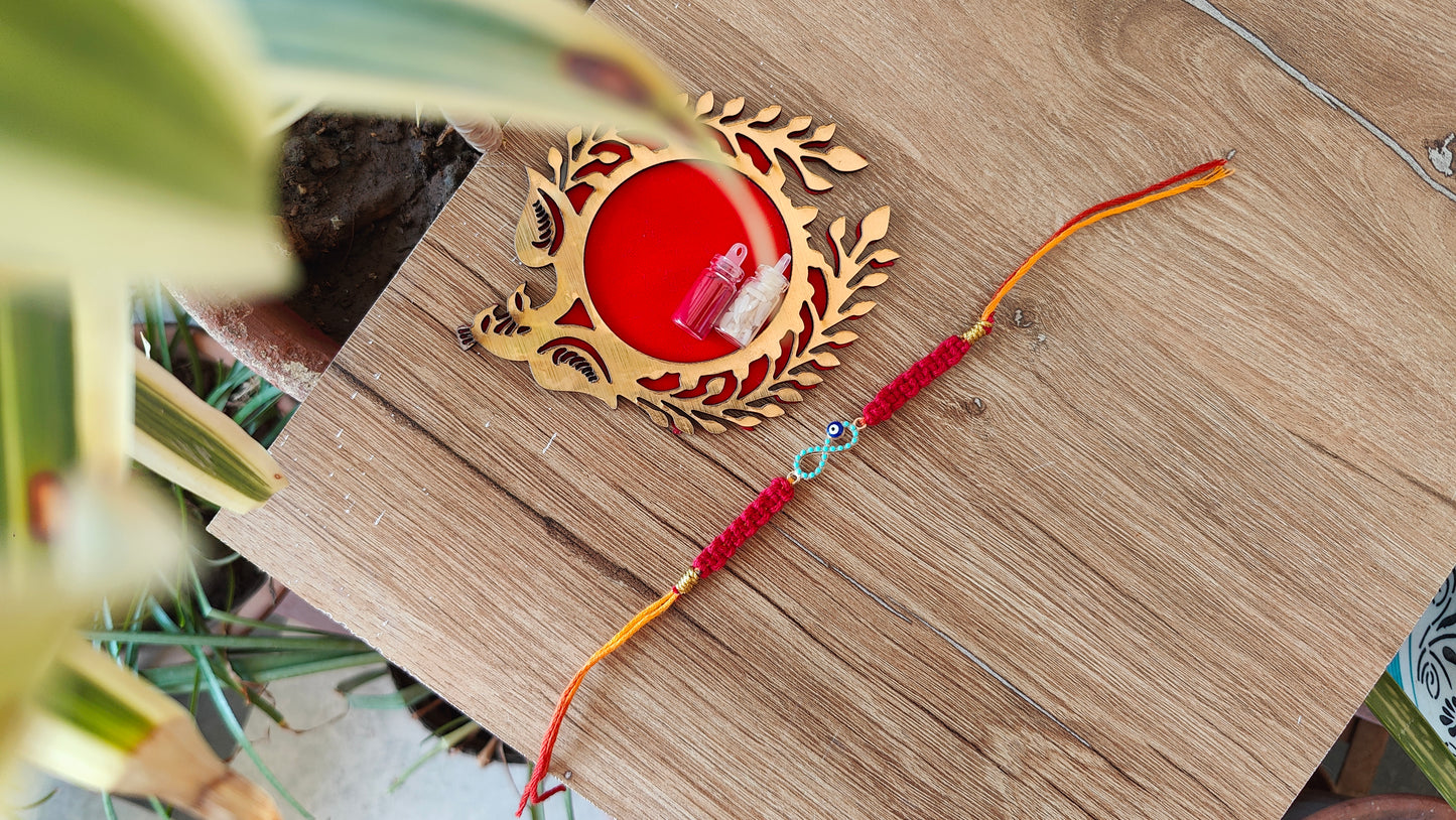 Infinity Blue Evil Eye Macrame Rakhi