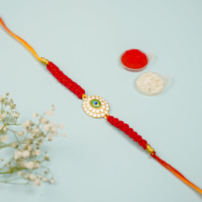 Oval golden peacock Macrame Rakhi