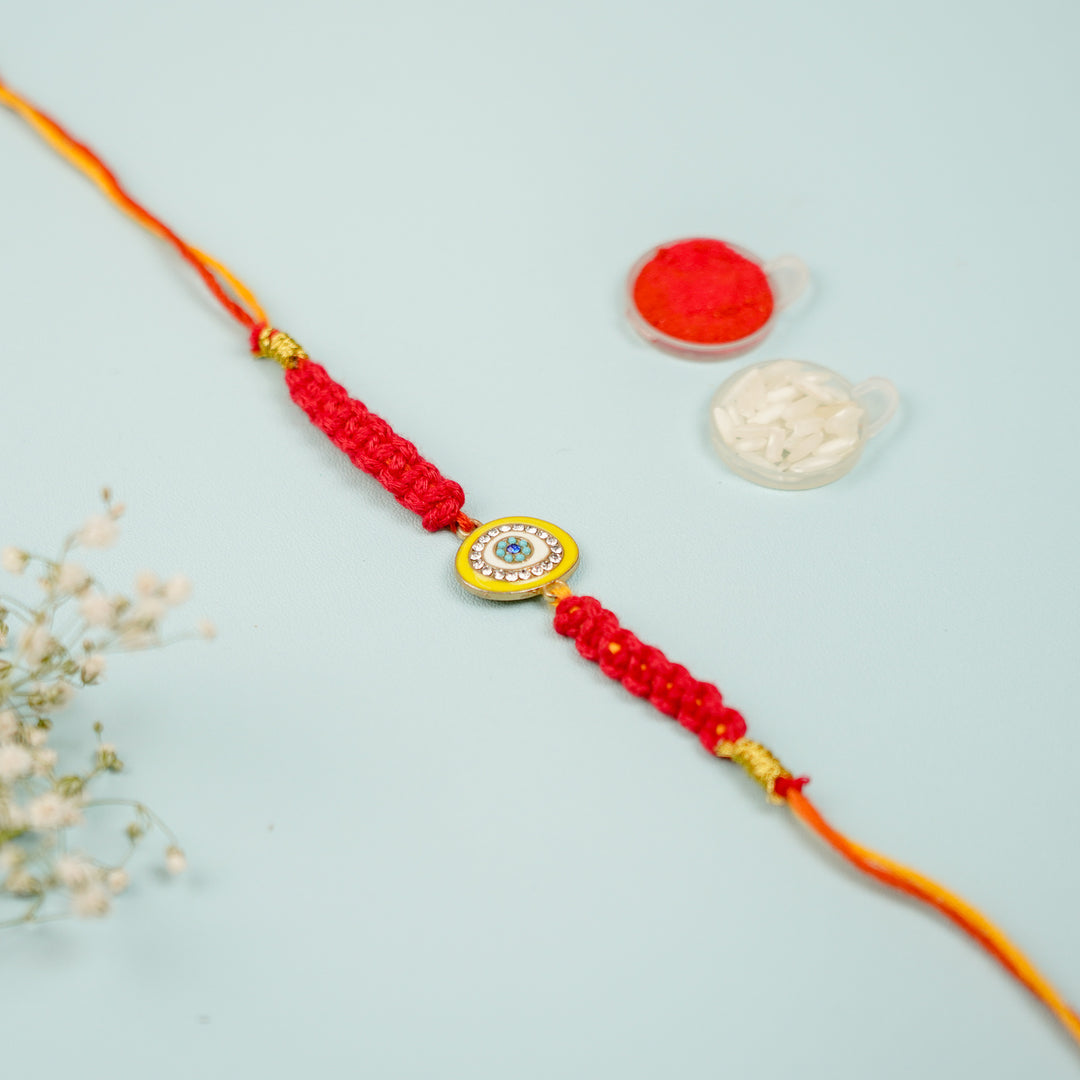 Yellow Eye Macrame Rakhi