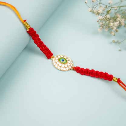 Oval golden peacock Macrame Rakhi