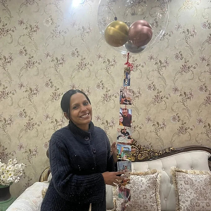Box with floating balloon